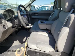 2007 Ford F-150 STX with VIN 1FTRX12W87FB51282, listed as a Copart auction lot 55580365 with 213,923 mi miles and Salvage title. Bid and sale history available at DreamBid. Image 7.