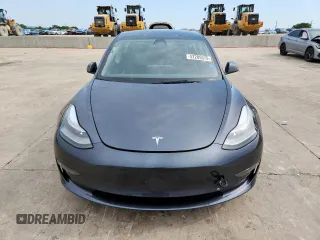 2023 Tesla Model 3 with VIN 5YJ3E1EA1PF468627, listed as a Copart auction lot 57285575 with 5,952 mi miles and Salvage title. Bid and sale history available at DreamBid. Image 5.