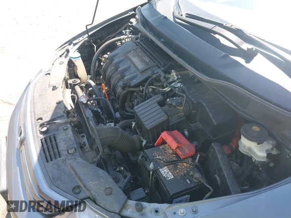 2010 Honda Insight EX with VIN JHMZE2H72AS015870, listed as a IAAI auction lot 42762384 with 58,121 mi miles and . Bid and sale history available at DreamBid. Image 10.