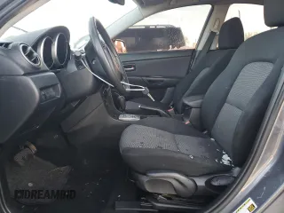 2007 Mazda 3 i Touring with VIN JM1BK32F571676258, listed as a Copart auction lot 87883545 with 141,203 mi miles and Salvage Title. Bid and sale history available at DreamBid. Image 7.