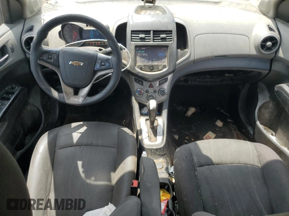 2014 Chevrolet Sonic LT with VIN 1G1JC5SH8E4242409, listed as a Copart auction lot 55356865 with 141,497 mi miles and Clean Title. Bid and sale history available at DreamBid. Image 12.