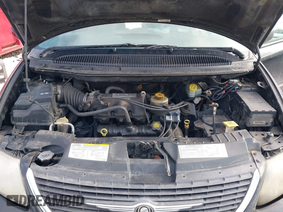 2004 Chrysler Town & Country Touring with VIN 2C4GP54L44R518281, listed as a IAAI auction lot 41397524 with 299,909 mi miles and . Bid and sale history available at DreamBid. Image 10.