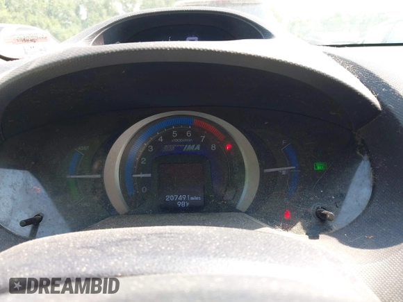2010 Honda Insight EX with VIN JHMZE2H78AS016893, listed as a IAAI auction lot 42420778 with 207,491 mi miles and . Bid and sale history available at DreamBid. Image 7.