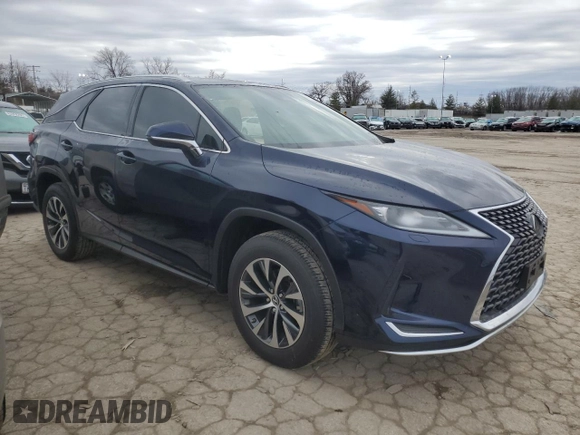 2021 Lexus RX with VIN JTJHZKFA5M2029909, listed as a Copart auction lot 44311725 with 30,556 mi miles and Salvage Title. Bid and sale history available at carsss.com. Image 4.