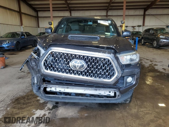 2019 Toyota Tacoma SR z VIN 3TMCZ5AN8KM197011, wystawiony jako Copart lot #56198675 z przebiegiem 117 363 mil mil oraz Szkoda całkowita • Salvage title. Historia ofert i sprzedaży dostępna na DreamBid. Obrazek 5.