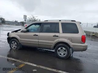 2004 Honda Pilot EX with VIN 2HKYF18604H582741, listed as a IAAI auction lot 41572039 with 225,101 mi miles. Bid and sale history available at carsss.com. Image 14.