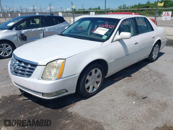 2006 Cadillac DTS 1SD z VIN 1G6KD57Y06U208812, wystawiony jako IAAI lot #42233924 z przebiegiem 120 244 mil mil oraz . Historia ofert i sprzedaży dostępna na DreamBid. Obrazek 2.