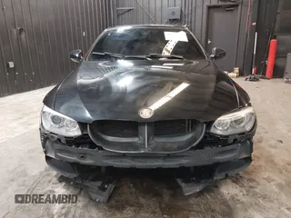 2011 BMW 3 Series 335is with VIN WBAKG1C51BE618450, listed as a IAAI auction lot 41555179 with 100,942 mi miles and . Bid and sale history available at carsss.com. Image 12.