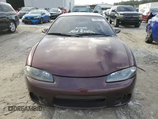 1999 Mitsubishi Eclipse with VIN 4A3AK44Y7XE104372, listed as a Copart auction lot 78361734 with 112,595 mi miles and Salvage Title. Bid and sale history available at DreamBid. Image 5.