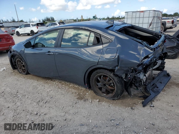 2024 Toyota Prius LE with VIN JTDACAAUXR3023011, listed as a Copart auction lot 61337595 with 25,660 mi miles and Non repairable. Bid and sale history available at DreamBid. Image 2.