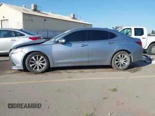 2016 Acura TLX with VIN 19UUB1F38GA002104, listed as a IAAI auction lot 41998966 with 124,159 mi miles. Bid and sale history available at carsss.com. Image 14.