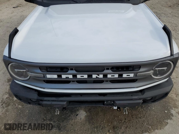 2024 Ford Bronco Big Bend z VIN 1FMDE7BH1RLA64327, wystawiony jako Copart lot #54401305 z przebiegiem 14 175 mil mil oraz Szkoda całkowita • Salvage title. Historia ofert i sprzedaży dostępna na DreamBid. Obrazek 12.