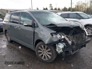 2013 Toyota Sienna XLE with VIN 5TDDK3DC7DS068591, listed as a IAAI auction lot 41483280 with 197,599 mi miles and . Bid and sale history available at DreamBid. Image 1.