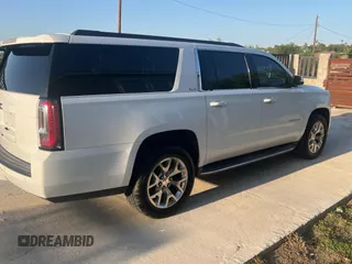 2016 GMC Yukon XL SLE with VIN 1GKS1FKC4GR126775, listed as a Copart auction lot 52828325 with 110,002 mi miles and Clean Title. Bid and sale history available at carsss.com. Image 4.