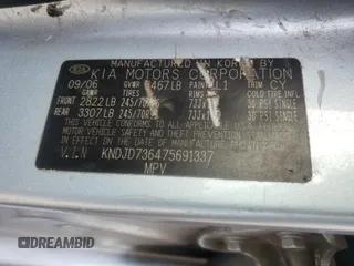 2007 Kia Sorento LX z VIN KNDJD736475691337, wystawiony jako Copart lot #57889615 z przebiegiem 279 716 mil mil oraz Szkoda całkowita • Salvage title. Historia ofert i sprzedaży dostępna na DreamBid. Obrazek 13.
