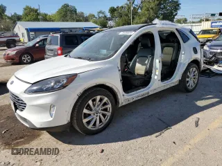 2021 Ford Escape Titanium Hybrid z VIN 1FMCU0DZ9MUB05415, wystawiony jako Copart lot #73430824 z przebiegiem 272 933 mil mil oraz Szkody całkowita. Historia ofert i sprzedaży dostępna na DreamBid. Obrazek 1.