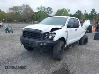 2009 Toyota Tundra 4WD Truck with VIN 5TFBW54119X085037, listed as a IAAI auction lot 41914195 with 211,913 mi miles. Bid and sale history available at carsss.com. Image 2.