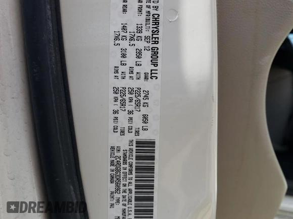 2013 Dodge Grand Caravan SE with VIN 2C4RDGBG3DR560962, listed as a Copart auction lot 53690225 with 124,796 mi miles and Salvage Title. Bid and sale history available at DreamBid. Image 13.
