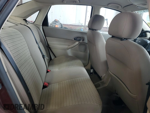 2007 Ford Focus S z VIN 1FAFP34N77W249390, wystawiony jako Copart lot #61817215 z przebiegiem 112 295 mil mil oraz Szkoda całkowita • Salvage title. Historia ofert i sprzedaży dostępna na DreamBid. Obrazek 10.
