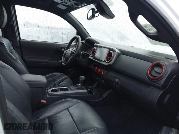 2021 Toyota Tacoma SR5 with VIN 3TMDZ5BN1MM100575, listed as a IAAI auction lot 41516274 with 61,974 mi miles and . Bid and sale history available at DreamBid. Image 5.