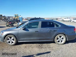 2012 Volkswagen Passat SE with VIN 1VWBP7A31CC008775, listed as a IAAI auction lot 41353437 with 118,815 mi miles. Bid and sale history available at carsss.com. Image 14.
