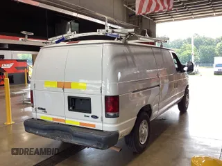 2013 Ford Econoline Cargo Commercial with VIN 1FTNE1EW9DDA61968, listed as a IAAI auction lot 42643038 with 121,719 mi miles and . Bid and sale history available at DreamBid. Image 2.