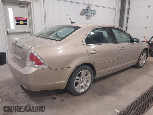 2007 Ford Fusion SEL with VIN 3FAHP02187R185614, listed as a IAAI auction lot 42027597 with 165,466 mi miles. Bid and sale history available at carsss.com. Image 4.