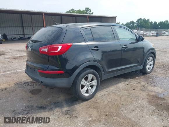 2012 Kia Sportage LX with VIN KNDPB3A28C7337795, listed as a IAAI auction lot 40118771 with 187,037 mi miles and . Bid and sale history available at DreamBid. Image 4.