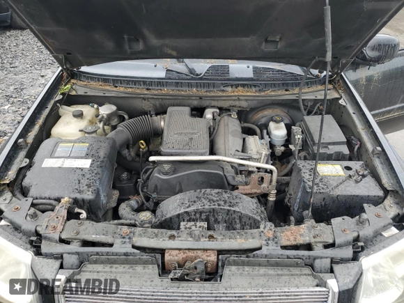 2005 GMC Envoy SLT with VIN 1GKDT13S452324077, listed as a Copart auction lot 57836195 with 299,146 mi miles and Clean title. Bid and sale history available at DreamBid. Image 12.
