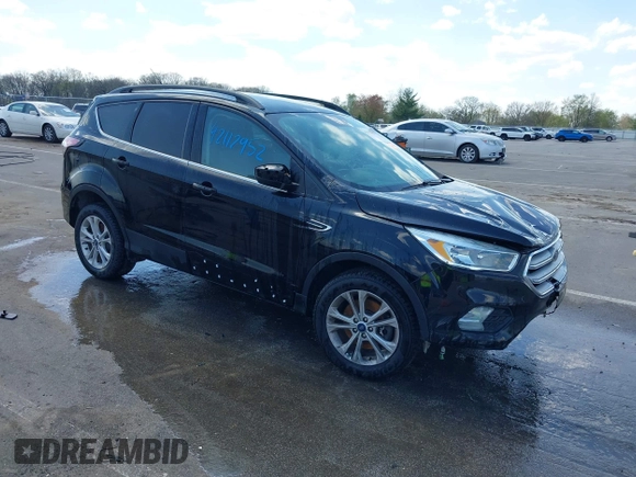 2018 Ford Escape SE z VIN 1FMCU9GD1JUD48846, wystawiony jako IAAI lot #42112952 z przebiegiem 117 580 mil mil oraz . Historia ofert i sprzedaży dostępna na DreamBid. Obrazek 1.