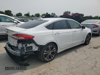 2019 Ford Fusion Titanium with VIN 3FA6P0K91KR217096, listed as a Copart auction lot 57796185 with 84,128 mi miles and Salvage title. Bid and sale history available at DreamBid. Image 3.