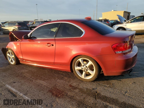 2009 BMW 1 Series 128i with VIN WBAUP735X9VF07209, listed as a Copart auction lot 85059184 with 114,727 mi miles and Salvage Title. Bid and sale history available at carsss.com. Image 2.