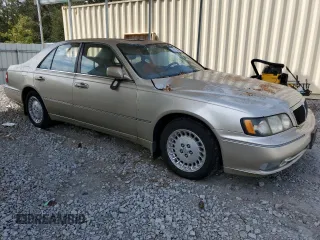 2000 Infiniti Q45 z VIN JNKBY31A0YM301297, wystawiony jako Copart lot #74672884 z przebiegiem 171 263 mil mil oraz Szkody całkowita. Historia ofert i sprzedaży dostępna na DreamBid. Obrazek 4.