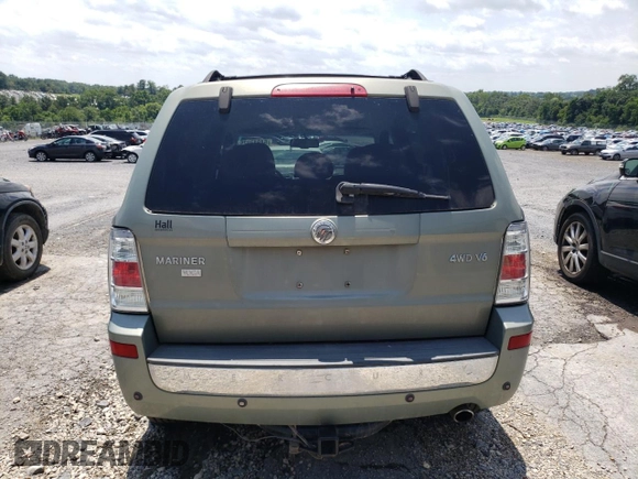 2008 Mercury Mariner Premier with VIN 4M2CU97178KJ45308, listed as a Copart auction lot 64947075 with 140,403 mi miles and Salvage title. Bid and sale history available at DreamBid. Image 6.