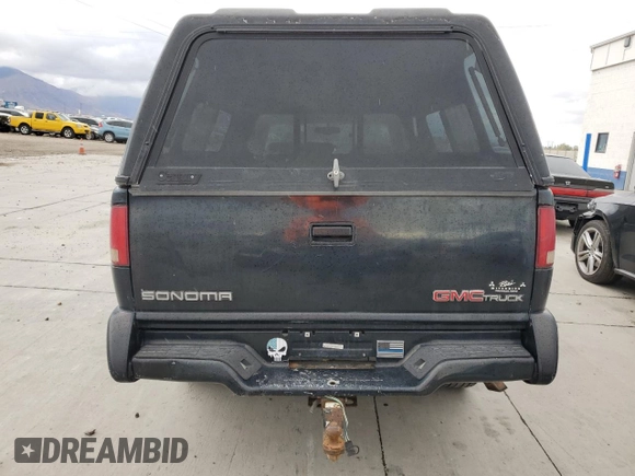 1997 GMC Sonoma SLS with VIN 1GTDT19W2V8504564, listed as a Copart auction lot 78217124 with 184,122 mi miles and Salvage Title. Bid and sale history available at carsss.com. Image 6.