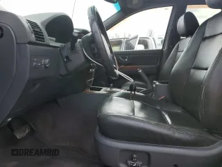 2003 Kia Sorento LX z VIN KNDJC733035032416, wystawiony jako Copart lot #52335745 z przebiegiem 167 707 mil mil oraz Czysty tytuł • Clean title. Historia ofert i sprzedaży dostępna na DreamBid. Obrazek 7.
