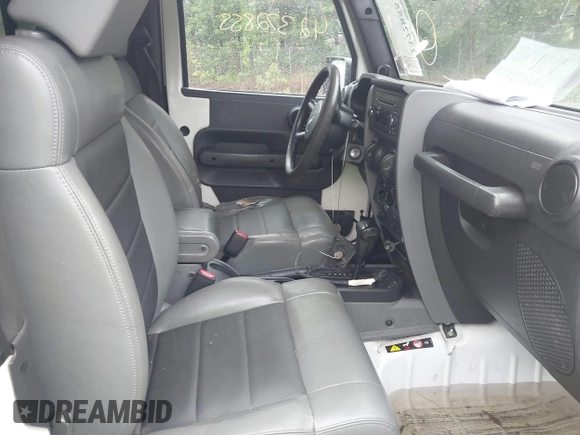 2009 Jeep Wrangler X with VIN 1J4FA24119L727658, listed as a IAAI auction lot 42372855 with 145,450 mi miles and . Bid and sale history available at DreamBid. Image 5.