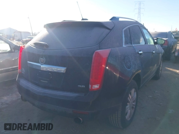 2016 Cadillac SRX Luxury Collection z VIN 3GYFNBE38GS585949, wystawiony jako IAAI lot #41413583 z przebiegiem 98 201 mil mil oraz . Historia ofert i sprzedaży dostępna na DreamBid. Obrazek 4.
