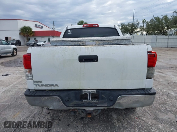 2010 Toyota Tundra with VIN 5TFEY5F12AX083418, listed as a IAAI auction lot 41352739 with 279,971 mi miles and . Bid and sale history available at DreamBid. Image 16.