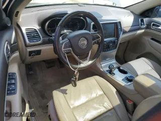2014 Jeep Grand Cherokee Overland with VIN 1C4RJFCT1EC379867, listed as a Copart auction lot 54106375 with 217,908 mi miles and Clean Title. Bid and sale history available at carsss.com. Image 8.