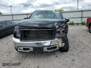 2019 Chevrolet Silverado 1500 LTZ with VIN 1GCUYGEL7KZ124884, listed as a Copart auction lot 58082934 with 124,904 mi miles and Salvage Title. Bid and sale history available at carsss.com. Image 5.