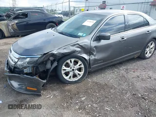 2012 Ford Fusion Hybrid с VIN 3FADP0L36CR164561, выставлен на аукционе IAAI как лот 42126136 с пробегом 172 387 миль миль и . История ставок и продаж доступна на DreamBid. Изображение 6.