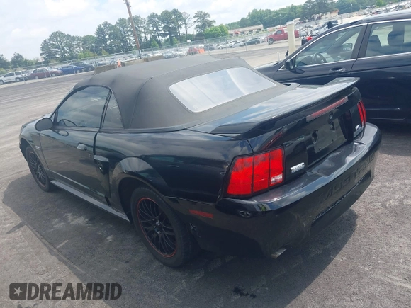 2003 Ford Mustang GT Deluxe z VIN 1FAFP45XX3F417295, wystawiony jako IAAI lot #42229765 z przebiegiem 161 488 mil mil oraz . Historia ofert i sprzedaży dostępna na DreamBid. Obrazek 3.
