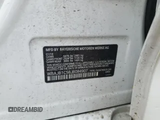 2018 BMW 5 Series 530e xDrive with VIN WBAJB1C58JB084907, listed as a Copart auction lot 49901795 with 109,617 mi miles and Salvage title. Bid and sale history available at DreamBid. Image 12.