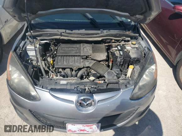 2014 Mazda 2 Sport with VIN JM1DE1KY6E0189739, listed as a Copart auction lot 76468914 with 107,164 mi miles and Salvage Title. Bid and sale history available at carsss.com. Image 11.