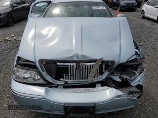 2007 Lincoln Town Car Signature Limited z VIN 1LNHM82W37Y623899, wystawiony jako Copart lot #57691315 z przebiegiem 181 687 mil mil oraz Szkoda całkowita • Salvage title. Historia ofert i sprzedaży dostępna na DreamBid. Obrazek 11.