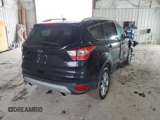2017 Ford Escape Titanium with VIN 1FMCU0JD2HUE71179, listed as a IAAI auction lot 41465849 with 95,426 mi miles. Bid and sale history available at carsss.com. Image 4.