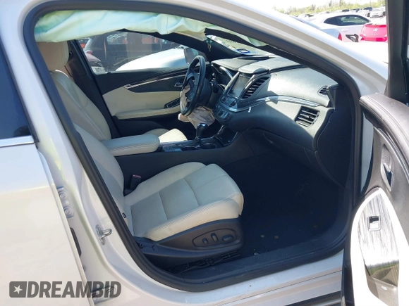 2018 Chevrolet Impala LT with VIN 1G1105S34JU106107, listed as a IAAI auction lot 41871693 with 111,412 mi miles and . Bid and sale history available at DreamBid. Image 5.