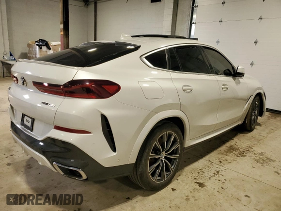 2020 BMW X6 xDrive40i z VIN 5UXCY6C07L9B43453, wystawiony jako Copart lot #52096845 z przebiegiem Nie podano mil oraz Szkoda całkowita • Salvage title. Historia ofert i sprzedaży dostępna na DreamBid. Obrazek 3.
