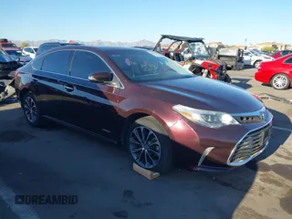 2016 Toyota Avalon XLE Premium z VIN 4T1BD1EB2GU053021, wystawiony jako IAAI lot #42024676 z przebiegiem 64 521 mil mil oraz . Historia ofert i sprzedaży dostępna na DreamBid. Obrazek 1.